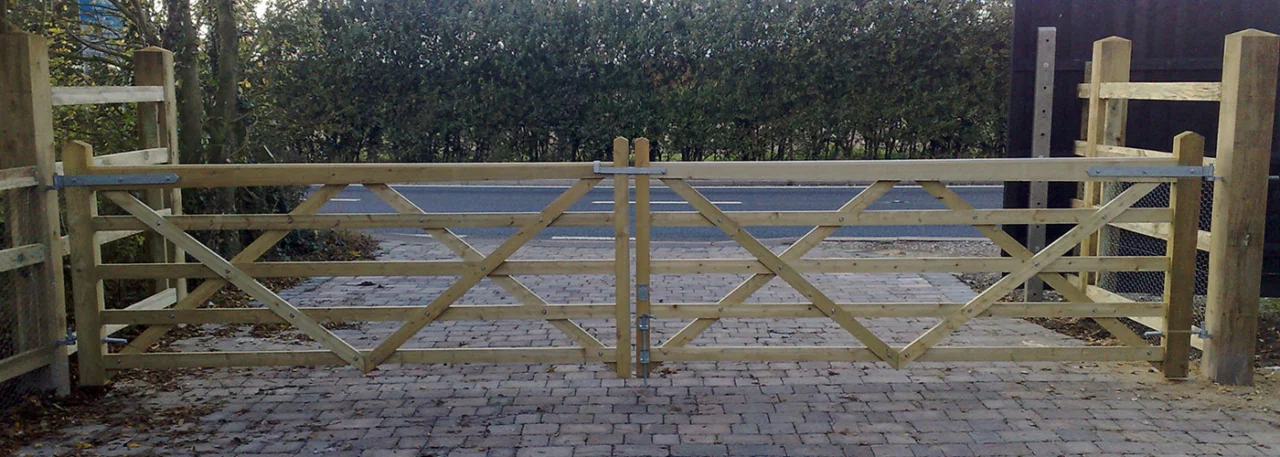 Pair of timber field gates across a driveway