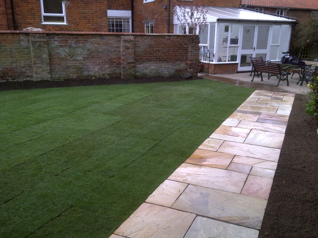 Stone garden path beside a lawn