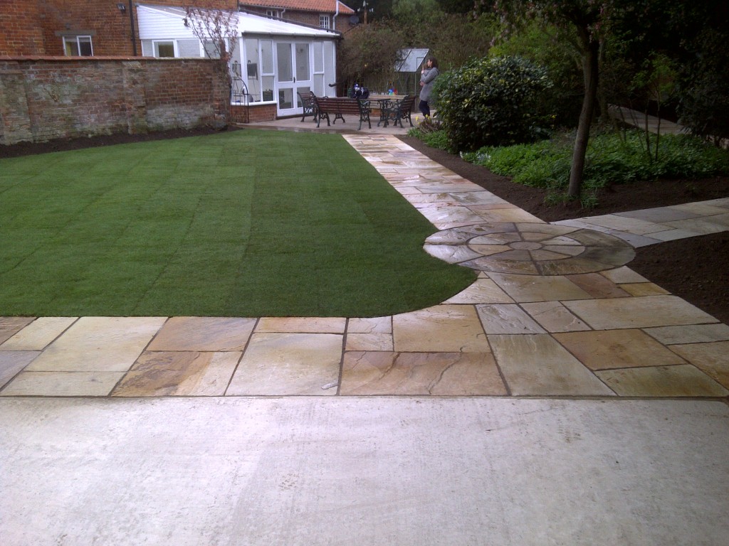 Completed lawn and stone garden paths