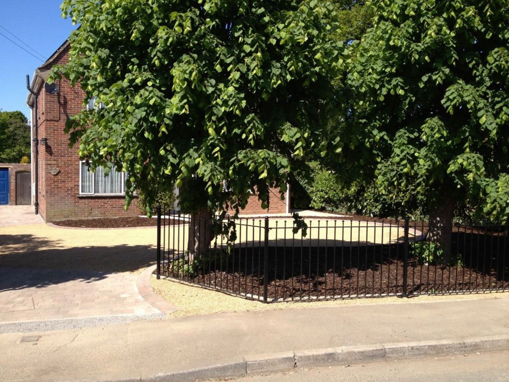 Completed paved front garden around an established tree